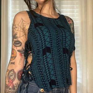 Green and black geometric print top